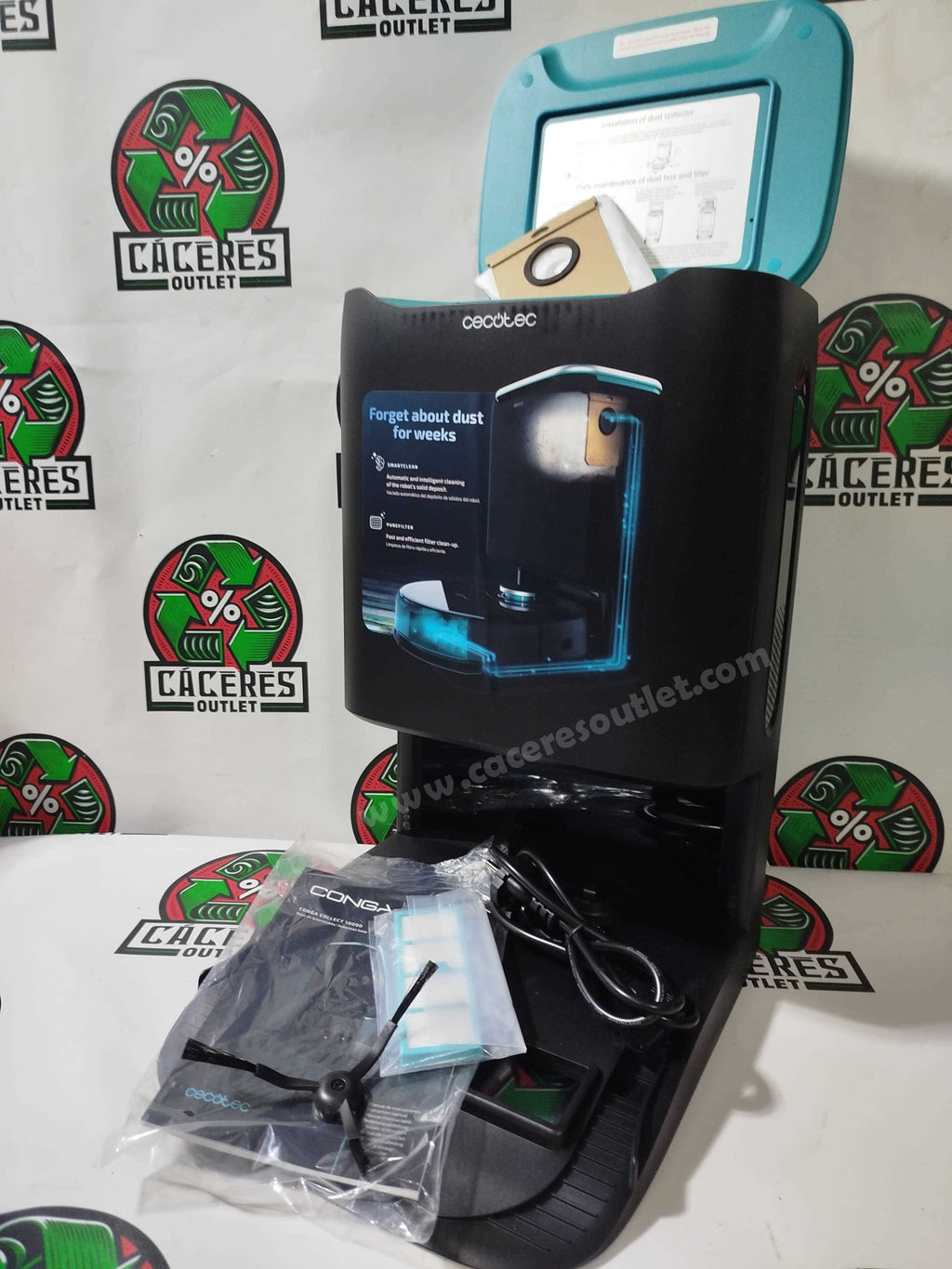 Cecotec Conga Serie 9090 robot vacuum in docking station with accessories.